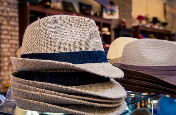 istock Hats for sale at a shop 1065793542