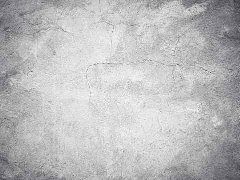 Close-up gray scratched grunge old wall texture background