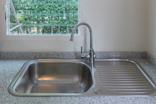 istock sink with faucet in kitchen room 1065809186