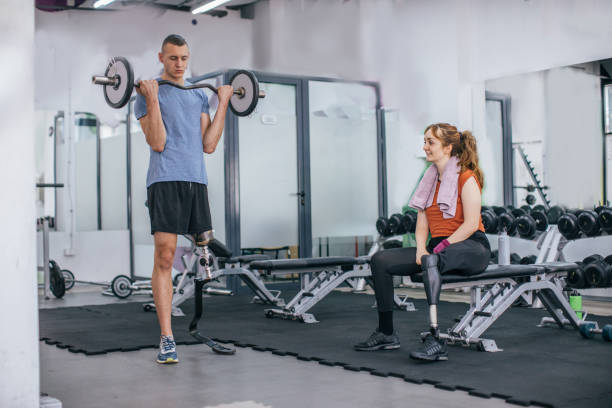 istock Young couple workout in the gym 1065811428