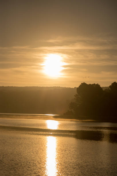 istock Sunset in the ruidera lagoons with the golden sky 1065814920