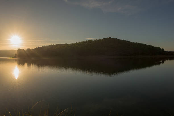 istock Sunset in the ruidera lagoons with the golden sky 1065814972