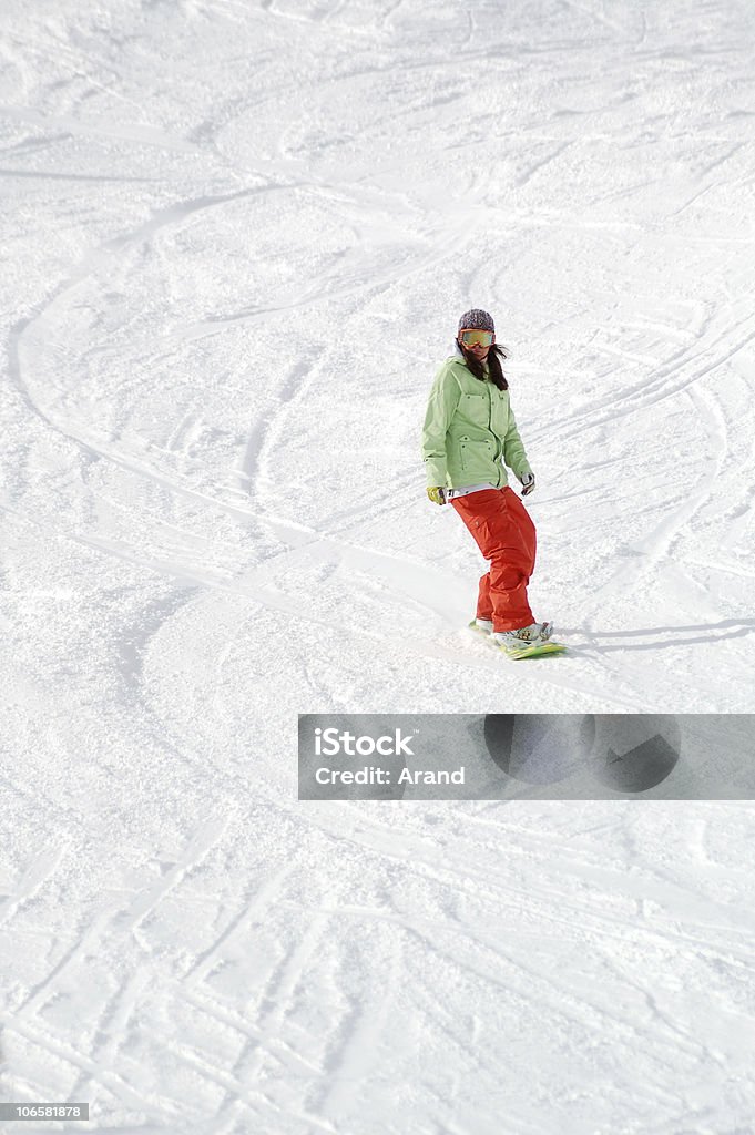 Faire du snowboard sur les pistes de ski - Photo de Activité de loisirs libre de droits