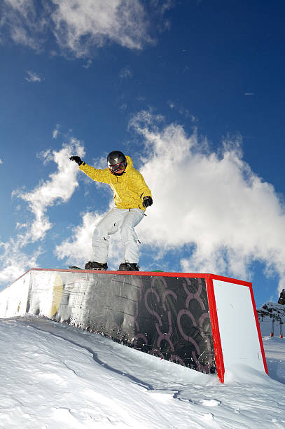 istock young snowboarder woman jibbing 106581988