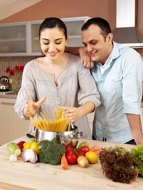 istock Young couple cooking in kitchen 106582185