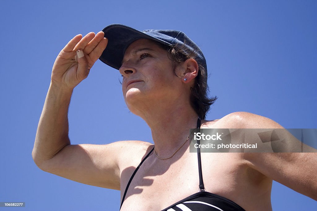 Mature woman looking into the distance  Adult Stock Photo