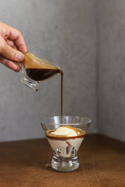 istock Pouring Coffee In Ice Cream 1065828120