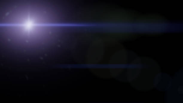 istock bright and beautiful blue lens flare effect overlay texture with bokeh effect and anamorphic light streak in front of a black background 1065829996