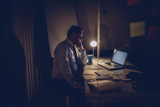 istock Mature man working late at night 1065831620