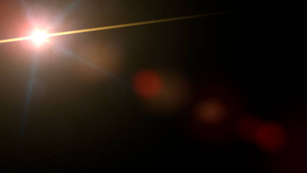 istock exotic lens flare effect overlay texture with bokeh effect and light streak in front of a black background 1065832474