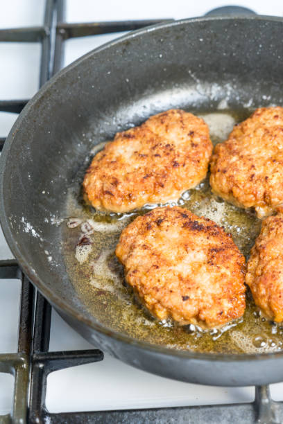 istock Minced cutlets are fried in a pan in boiling oil. 1065835808