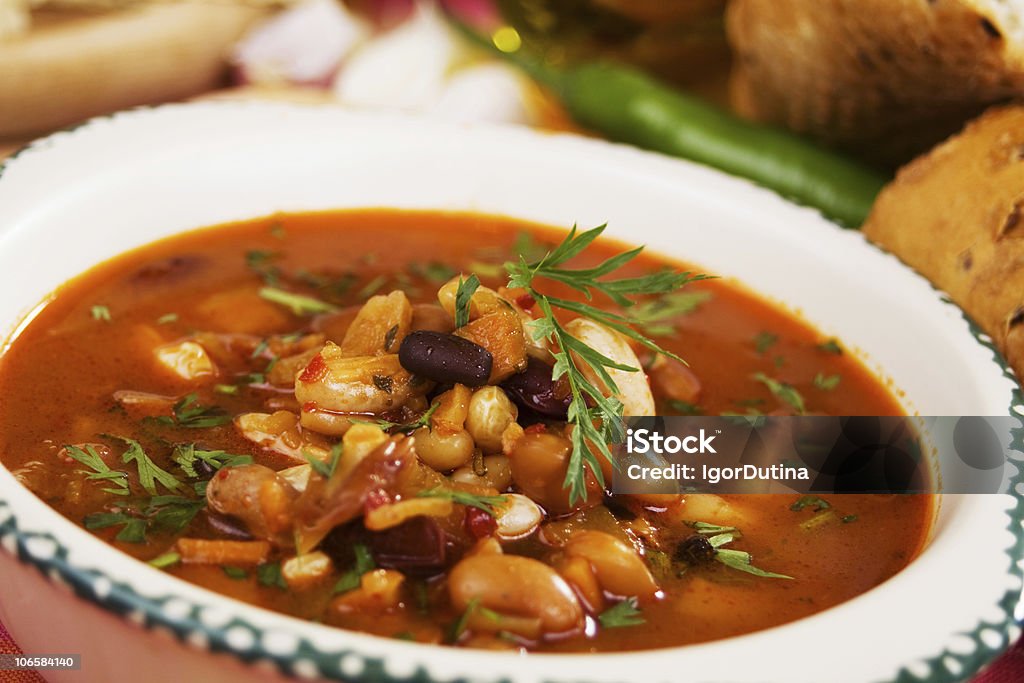 Close up of kidney bean soup in white bowl Traditional homemade thick kidney bean soup served as main dish Bean Soup Stock Photo