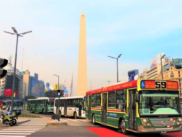 Service of buses. Local Metrobus at Av. 9 de Julio, Buenos Aires, Argentina. stock photo