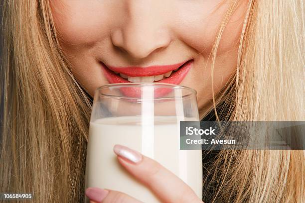 Blond Woman Drinking Milk Stock Photo - Download Image Now - Adult, Adults Only, Beautiful People
