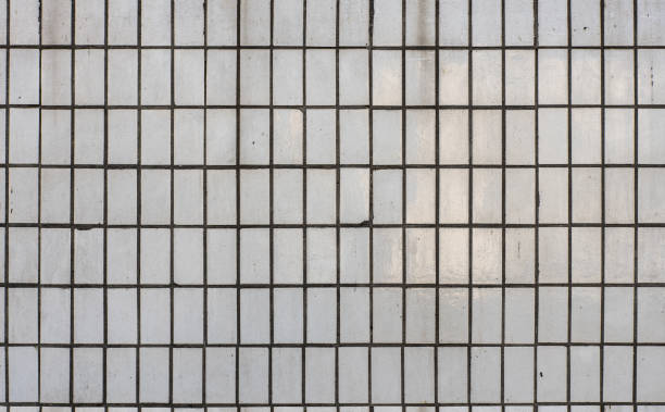 istock Ceramic USSR tile abstract texture in light grey color, typical soviet tiles on typical buildings 1065851328