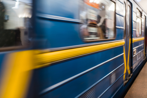 Kyiv underground metropolitan train in motion blur, moving with passengers