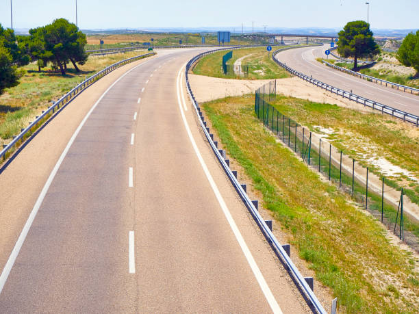 istock A european highway without traffic. 1065853410