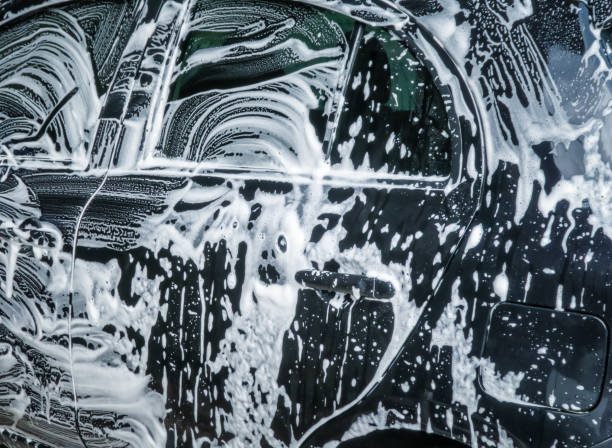 istock Car wash bubbles with soap. Close up 1065857330