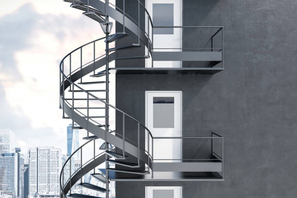 istock Gray building with gray emergency stairs 1065858928