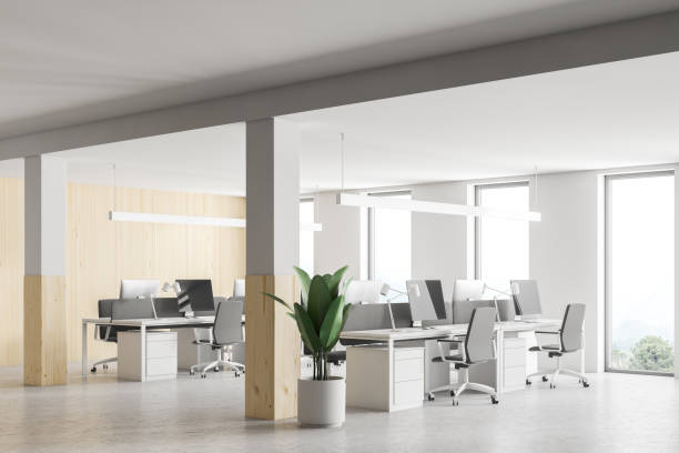 istock Loft office with wooden and white walls 1065859792