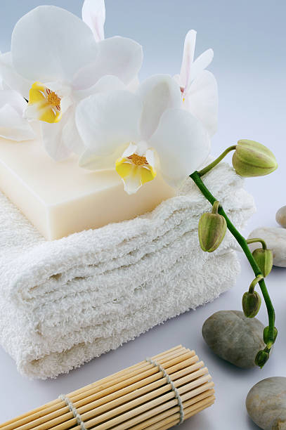 istock soap with towels and orchid 106586130