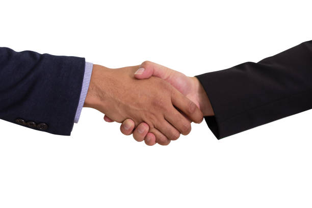 istock Businessman shaking hands to make business dealing 1065865428