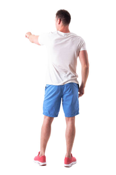 Rear View of the Sad Young Man Isolated on the White Background