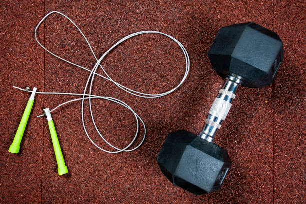 istock dumbbell and jump rope 1065867944