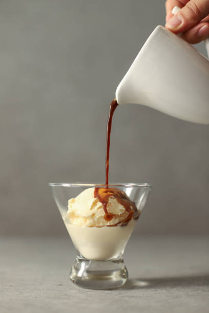 istock Pouring Coffee In Ice Cream 1065868576