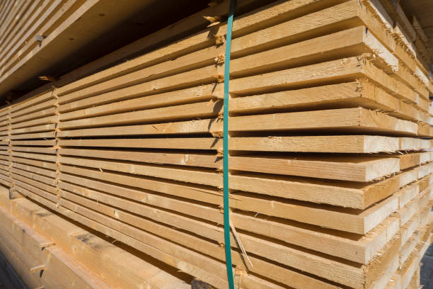 istock Stacked wooden planks on lumberyard 1065870848
