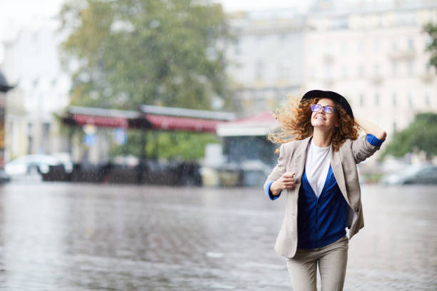 istock Girl in the rain 1065872072