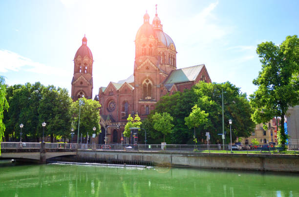 istock St. Luke Church near Isar river in Munich, Germany 1065873364