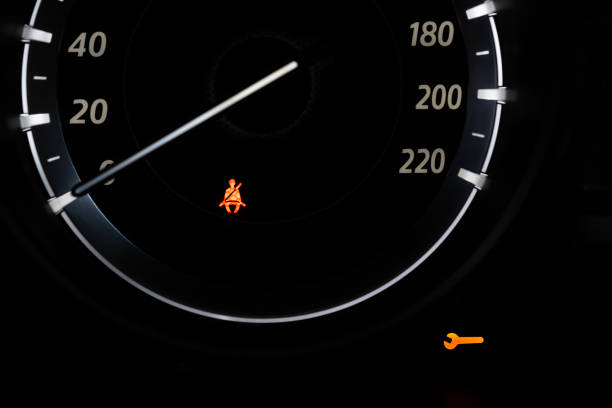 istock Car Dashboard showing the seat belt warning light. 1065873954