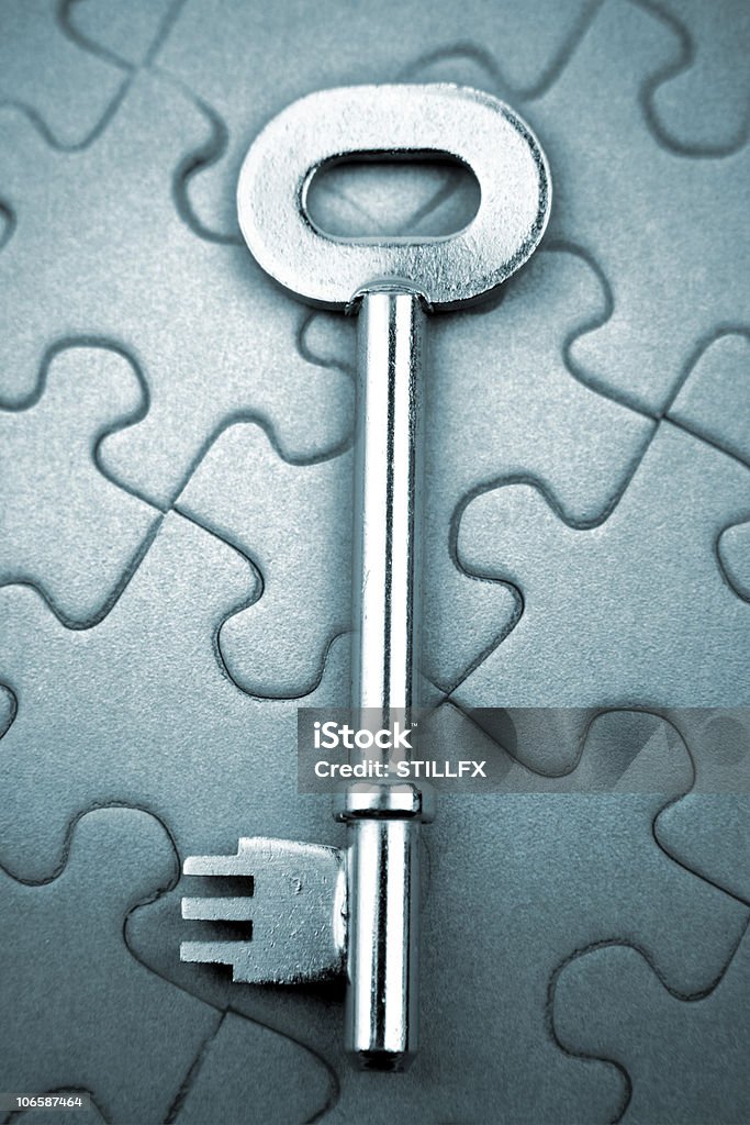 Schlüssel auf puzzle - Lizenzfrei Auseinander Stock-Foto