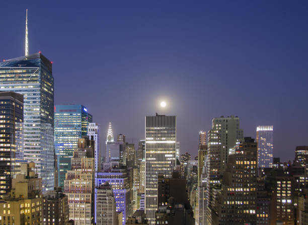 New York buildings illuminated by moonlight stock photo