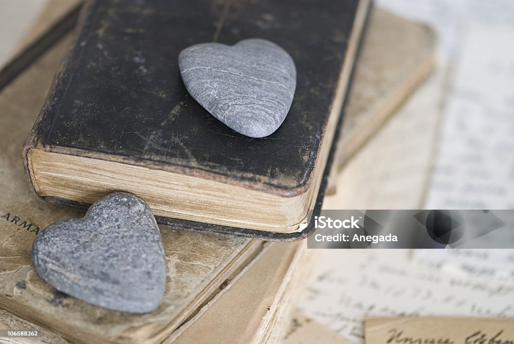 two stone hearts  Book Stock Photo