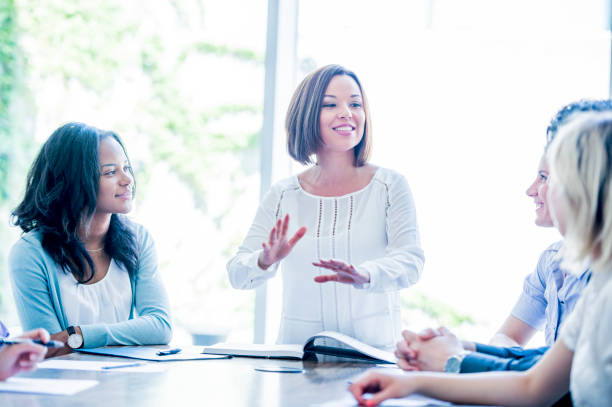 istock Businesswoman leads meeting 1065883620