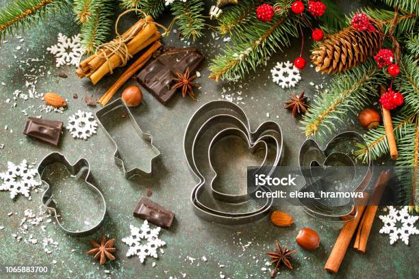 Ingredients For Christmas Gingerbread Baking Chocolate Cinnamon Anise And Nuts On Dark A Stone Or Slate Background Seasonal Food Background Stock Photo - Download Image Now