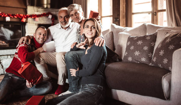 istock happiness two generation family on the sofa for christmas 1065886970