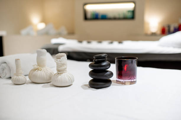 istock Massage herbal bags with stones 1065892936