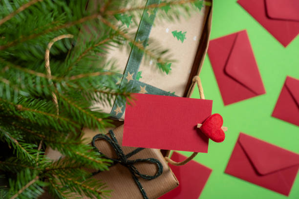 istock Paper note caught on the Christmas bag handle 1065894338