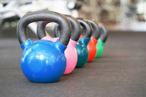 istock Colorful kettlebells in gym 1065899754