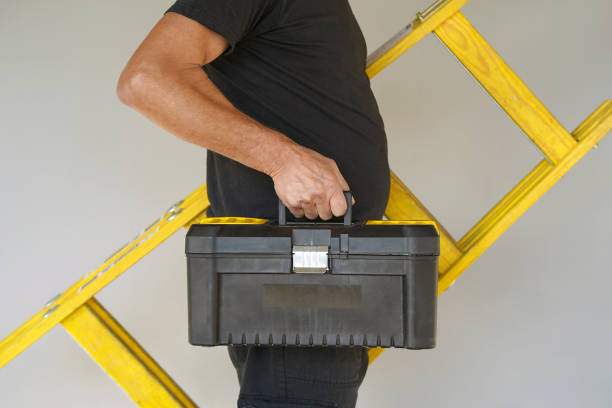 istock worker with wooden ladder 1065901946