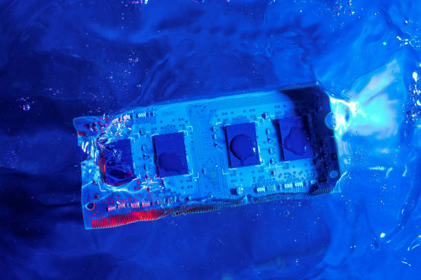 istock RAM memory from a laptop, ram. Blue and red light, under water. Technology of cyber-electronic concept. Technological background 1065904354