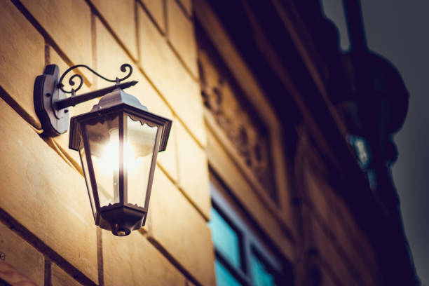 istock Retro exterior lamp lit in the evening 1065905684