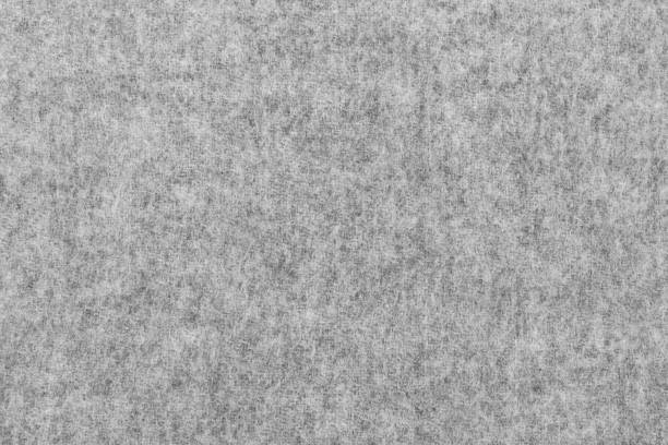 Gray Wool Felt Background Texture Warm Gray Wool Felt Close-up felt textile stock pictures, royalty-free photos & images