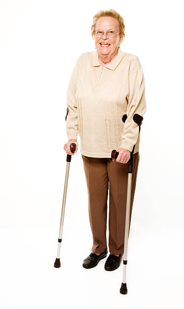 istock senior woman with crutches 106591026
