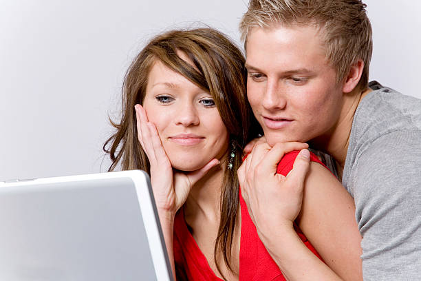istock young couple with a laptop 106592106