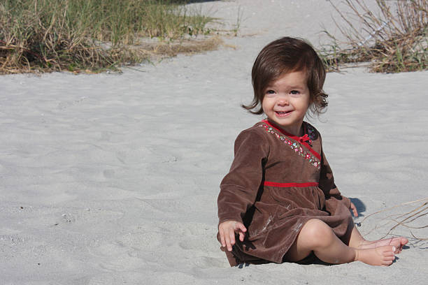 istock Happy girl in the sand 106593456
