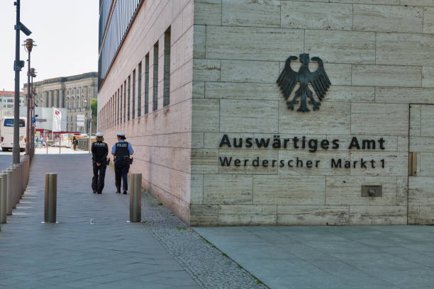 Women police patrol Ministry of Foreign Affair in Berlin, Germany. BERLIN, GERMANY - JULY 14,2018: Women police patrol the street and Ministry of Foreign Affair in downtown. Berlin is the capital and German largest city by both area and population. minister clergy photos stock pictures, royalty-free photos & images